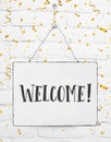 Board sign with text hello welcome sign come in golden party con Royalty Free Stock Photo