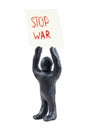 Board stop war.A man with a poster stop war. Peaceful protesters. Figurine with a poster