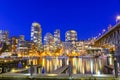 Board walk and marina docking along False Creek at blue hour in Vancouver BC, Canada Royalty Free Stock Photo