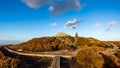 Board walk and monument in Wicklow mountains , sunset, Ireland