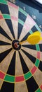 Dart Board game is a game that uses a tool called 'darts.' The arrow will be aimed at the target on the dartboard Royalty Free Stock Photo