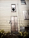 A boarded up, abandoned house