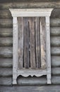 Boarded-up window of an old country wooden house Royalty Free Stock Photo