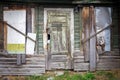 Boarded up windows and old door Royalty Free Stock Photo