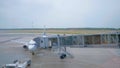 Boarding on airplane through the airbridge.