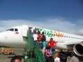 Boarding an airplane in Puerto Princessa on the Philippines 21.12.2012 Royalty Free Stock Photo