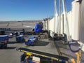 At the Airport! Cargo Workers Loading a Jet on the Tarmac Before Boarding! Royalty Free Stock Photo