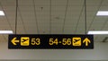 Boarding gate sign in airport. Airport Departure information board sign in terminal at airport. Royalty Free Stock Photo