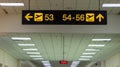 Boarding gate sign in airport. Airport Departure information board sign in terminal at airport. Royalty Free Stock Photo