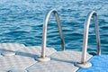 Boarding Ladder for Swimmers Mounted on a Plastic Floating Dock