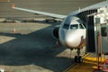 Boarding plane. Airplane at the gate in airport