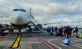 Boarding  the plane on the tarmack Royalty Free Stock Photo