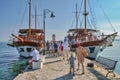 Boarding tourists on tourist boats