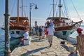 Boarding tourists on tourist boats