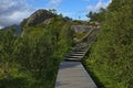Boardwalk at Austnesfjorden resting place at Torvvika on the Scenic Route Lofoten in Troms county, Norway Royalty Free Stock Photo
