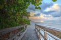 Boardwalk entering North Gulf Shore Beach in Naples Florida at Sunrise Royalty Free Stock Photo