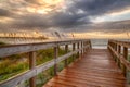 Boardwalk Leading to the Beach at Sunrise Royalty Free Stock Photo