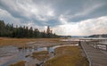 Boardwalk next to Tangled Creek and Black Warrior Springs leading into Hot Lake in Yellowstone National park in Wyoming USA Royalty Free Stock Photo