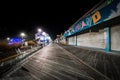 The boardwalk at night, in Ocean City, Maryland. Royalty Free Stock Photo
