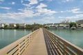 Boardwalk over the brackish water of a lake near the residential area at Destin, Florida Royalty Free Stock Photo