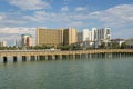 Boardwalk over the lake with brackish water near the buildings in Destin, Florida Royalty Free Stock Photo