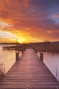 Boardwalk over water at sunrise, near Amsterdam The Netherlands Royalty Free Stock Photo