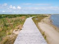 Boardwalk path of nature trail on manmade island of Marker Wadden in Markermeer, Netherlands Royalty Free Stock Photo