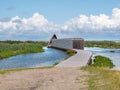 Boardwalk path to bird hide on manmade island Marker Wadden in Markermeer, Netherlands