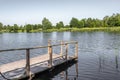 Boardwalk pier by the lake in summer Royalty Free Stock Photo