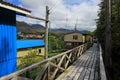 Boardwalk, Puerto Eden in Wellington Islands, fiords of southern Chile Royalty Free Stock Photo