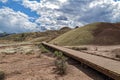 Boardwalk trail through the claystone hills at the Painted Hills Unit of the John Day Fossil Beds National Monument, Oregon, USA Royalty Free Stock Photo