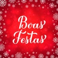 Boas Festas calligraphy isolated on red background with bokeh and snowflakes. Happy Holidays lettering in Portuguese Royalty Free Stock Photo
