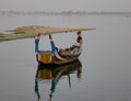 A boat on Amarapura lake at Ubein bridge Royalty Free Stock Photo