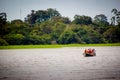 A boat in the amazon river jungle lagoon Royalty Free Stock Photo