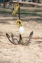 A Boat anchor Nongor in a summer sea beach. Iron metal make device Equipment. Technology to connect a nautical vessel with