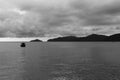 Boat Anchored South China Sea Distant Island Dark Sky Monochrome Royalty Free Stock Photo