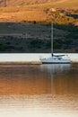 Boat Anchored in Tomales Bay at Sunset Royalty Free Stock Photo