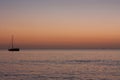 A boat anchoring near Uoleva during sunset