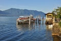 Boat approaching Cannero Riviera, Lake - lago - Maggiore, Italy. Royalty Free Stock Photo