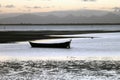 A boat on the beach and montains