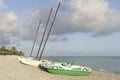 Boat on the beach, season of rains, thunderclouds