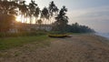 Boat on the beach at sunrise