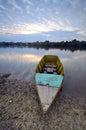 Boat on the beach at sunrise time Royalty Free Stock Photo