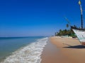 boat on the beach, tropical beach, clean water and blue sky Goa beach, Indian ocean beach. fishing boat in beach.