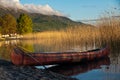 Boat in the beautiful lake Ohrid behind the reed Royalty Free Stock Photo