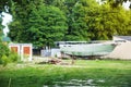 A boat being repaired on dry land Royalty Free Stock Photo