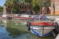 Boat with beverage on Burano island, near Venice, Italy.