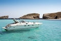 Boat on blue lagoon