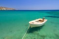 Boat on the blue lagoon of Vai beach Royalty Free Stock Photo
