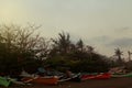 Boat on board at beach in the evening